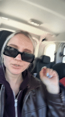 Person in sunglasses observed talking in car in Yassıören
