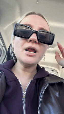 Person in sunglasses observed talking in car in Yassıören