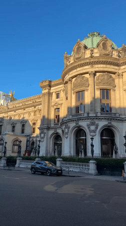 Golden light on a grand domed building in Paris