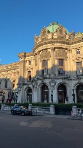 Golden light on a grand domed building in Paris