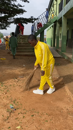 Morning cleanup and student activity at Gura Top school