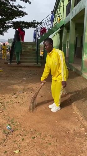 Morning cleanup and student activity at Gura Top school