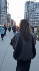 Evening street activity captured in Murino, Russia
