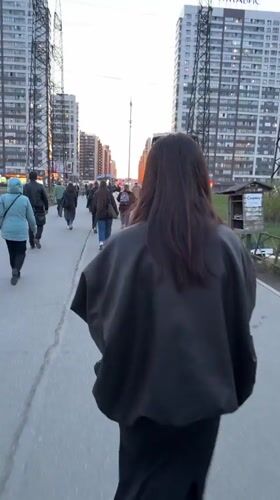 Evening street activity captured in Murino, Russia