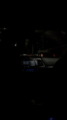 Police lights flash during nighttime traffic stop in Yerevan