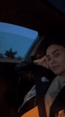 Evening car journey captured in twilight Tbilisi