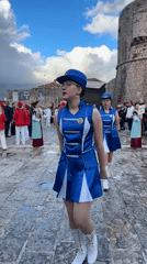 Marching band and majorettes perform in Budva square