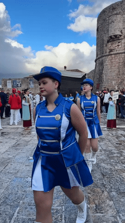 Marching band and majorettes perform in Budva square