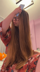 Woman performs evening skincare routine in Saint Petersburg apartment