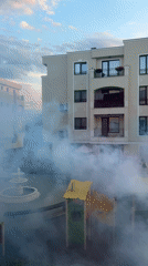 Fogging operation sweeps Plovdiv residential courtyards at sunset