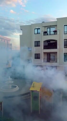 Fogging operation sweeps Plovdiv residential courtyards at sunset