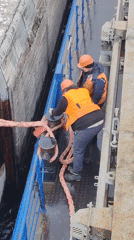 Maritime workers handle equipment on Volga-Baltic Waterway vessel