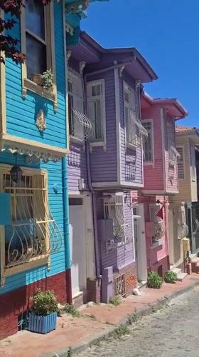 Colorful wooden houses and a domed mosque in historic Istanbul