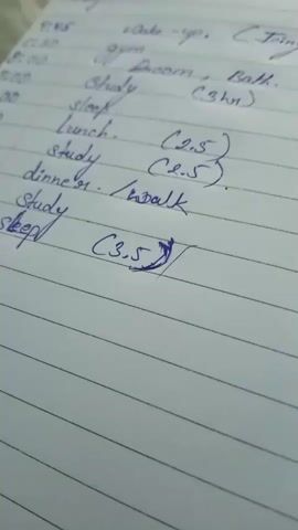 The video shows a close-up of a handwritten schedule on lined paper. The writing is in blue ink. The schedule lists various activities with times and durations. The visible entries include: 07:45 Wake-up. (30 min), 08:00 Gym, 09:00 Study. (3 hr), 12:00 Sleep, 14:00 Lunch. (2.5 hr), 16:00 Study. (2.5 hr), 18:00 Dinner. /Walk, 20:00 Study, 23:00 Sleep. (3.5 hr). The last entry is circled. The lighting suggests an indoor environment, possibly a desk.
