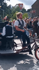 Street parade with live music rolls through Aizpute, Latvia