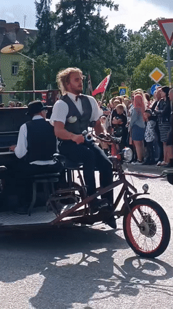 Street parade with live music rolls through Aizpute, Latvia