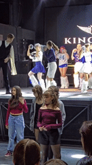 Youth cheerleader dance performance at Moscow nightclub venue