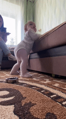 Family documents toddler's playtime moments in rural Russian home