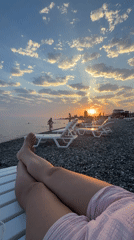 Sunset afternoon on a Black Sea pebble beach in Abkhazia