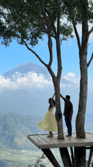 Wooden treehouse platform with mountain views in Abang, Bali