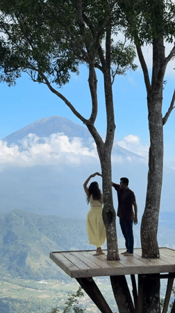 Wooden treehouse platform with mountain views in Abang, Bali