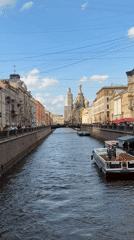 Everyday street life documented across Saint Petersburg canals and crosswalks