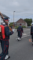 Historical military parade draws crowds in Belgian village