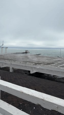 Overcast seaside moment captured from balcony in Sochi
