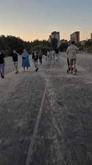 Evening leisure activities observed around Voronezh waterfront during sunset