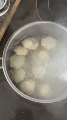 Cooking dumplings captured on video in Russian kitchen