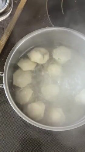 Cooking dumplings captured on video in Russian kitchen
