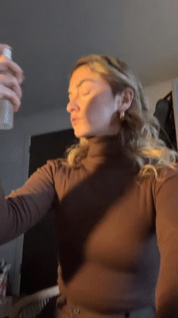 Woman documents grooming routine and outfit in Salford home