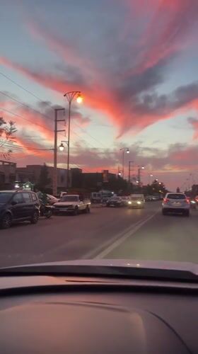 Normal traffic flows through Ourika streets during May evening