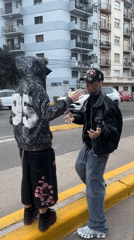 Two young men spotted on Buenos Aires sidewalk