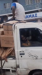 Street vendors and pedestrians document daily commerce activity