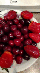 Fresh cherries and strawberries served in Yekaterinburg kitchen