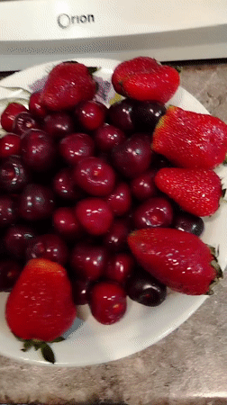 Fresh cherries and strawberries served in Yekaterinburg kitchen