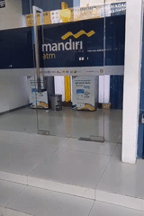 Street scene outside a Mandiri ATM in Cirebon
