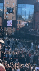 Large crowd gathers for outdoor event in Saint Petersburg courtyard