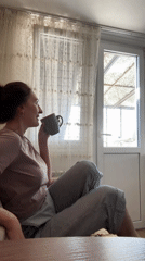 Woman's quiet domestic moments captured in Sochi apartment