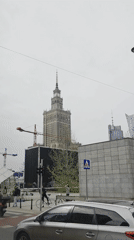 Warsaw landmarks filmed from street level on cloudy morning