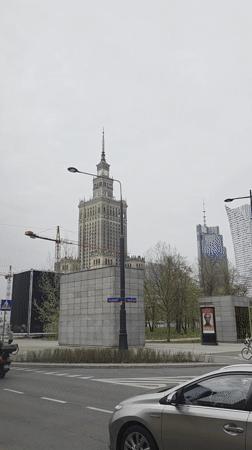 Warsaw landmarks filmed from street level on cloudy morning