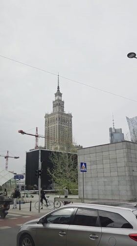 Warsaw landmarks filmed from street level on cloudy morning