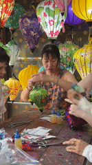 Traditional lantern crafting and cultural exhibits documented in Hội An