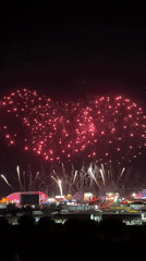 Fireworks over a Loures festival near Vasco da Gama Bridge