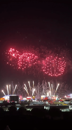 Fireworks over a Loures festival near Vasco da Gama Bridge