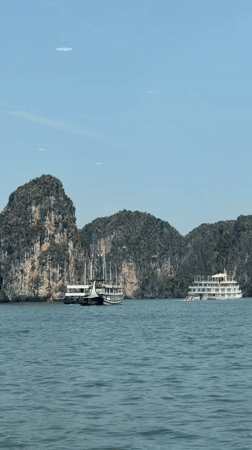 Tourists document serene morning views of Ha Long Bay
