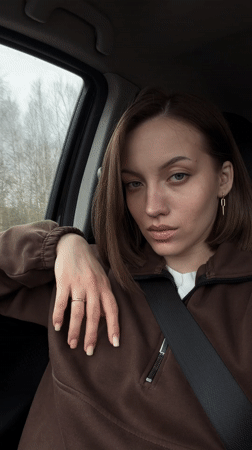 Woman observed in passenger seat of car in Titkovo