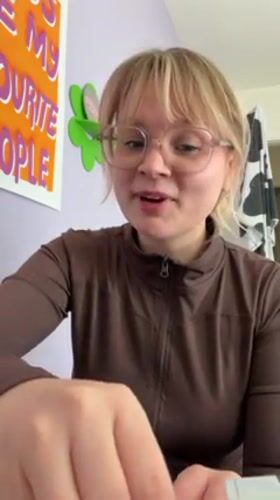 Woman showcases purple ring, cooks in Tel Aviv kitchen