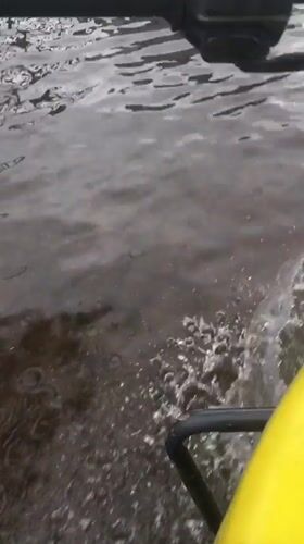 Daily life continues in Ado Nigeria despite street flooding